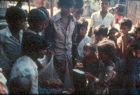 Food distribution to children - A Kind of Living - slide 39