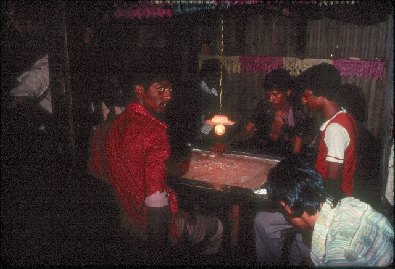 Youth playing carrom- slide 64 - A Kind of Living