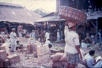 Vegetable vendors at market - A Kind of Living - slide 66