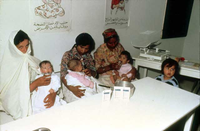 Slide 14 - This scene shows mothers in a health clinic in Tunisia being taught how to prepare and use oral rehydration solutions for their infants with diarrhoea.